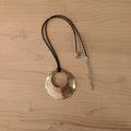 Collana di ottone bucata